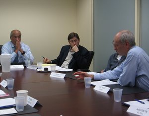 Arthur Segel, David Moss, and Michael Sandel at an Institutions of Democracy meeting.